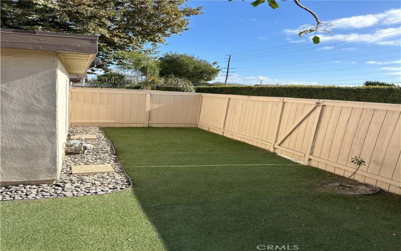 Outdoor back fenced in patio