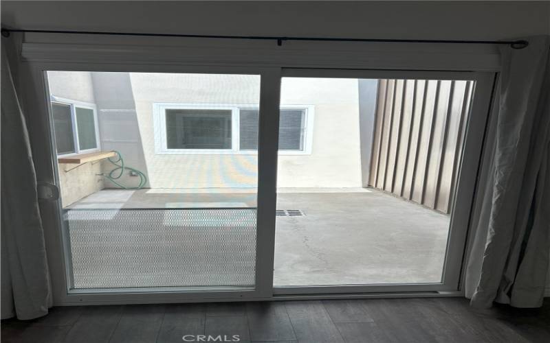 Center Atrium - sliding door in the primary bedroom