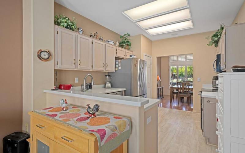 Kitchenette view towards kitchen and din