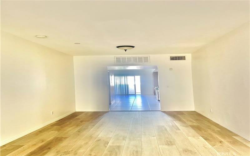 Living room looking towards breakfast nook and kitchen