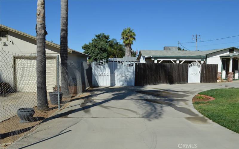 Driveway to RV parking space and metal shop