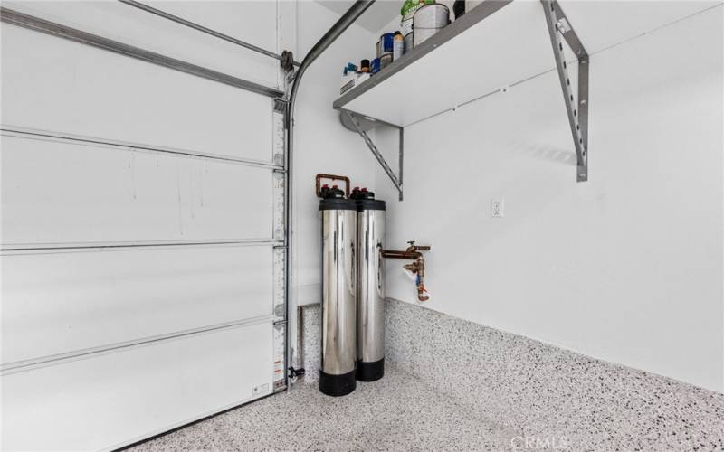 The extra large 2-car garage is highly upgraded and includes epoxy flooring, heavy duty adjustable wall storage shelves, ceiling storage, lighting and NEW premium washable paint!
