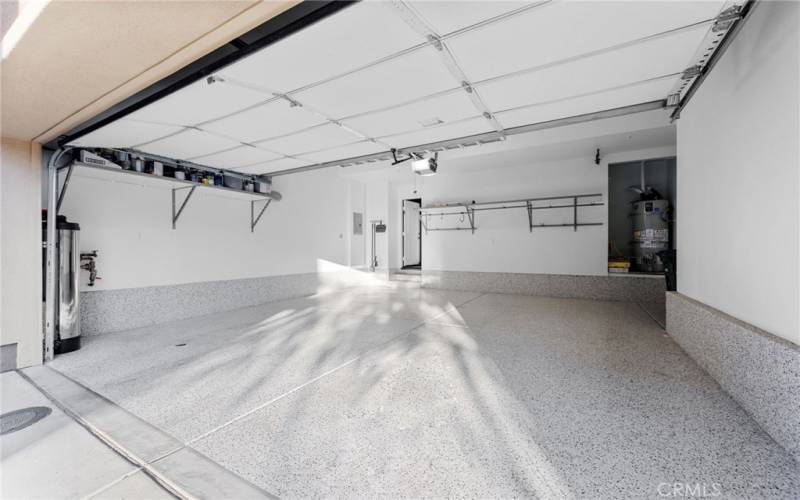 The extra large 2-car garage is highly upgraded and includes epoxy flooring, heavy duty adjustable wall storage shelves, ceiling storage, lighting and NEW premium washable paint!
