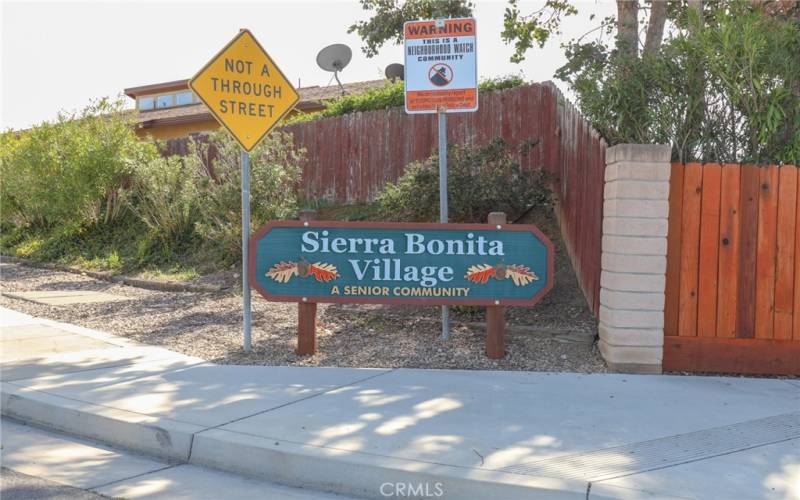 Tucked into the Sierra Bonita Village planned 55+ senior community is a move-in-ready home.