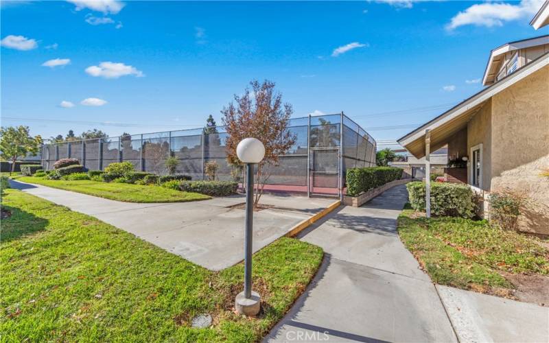 Quiet Location with a Tennis Court just steps from your front door.