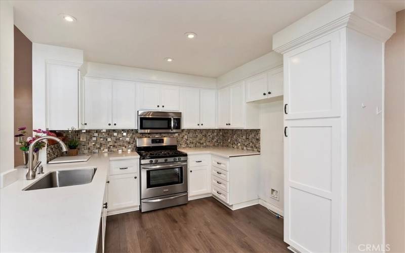 Crisp White Cabinetry - Recessed Lighting