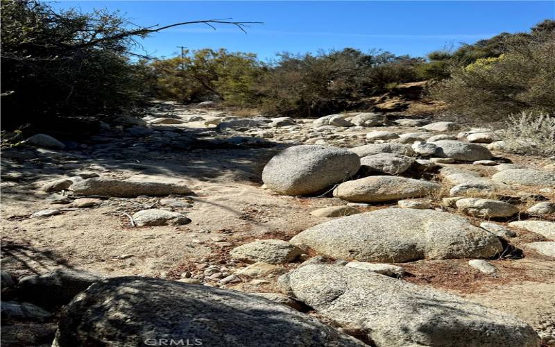 Seasonal creek through property