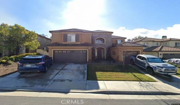 A view of the front of your new home. Two car garage on the left that has access to the house in a one car on the right.