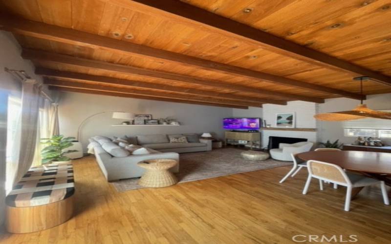 Great room w/ open beam ceiling (unfurnished)