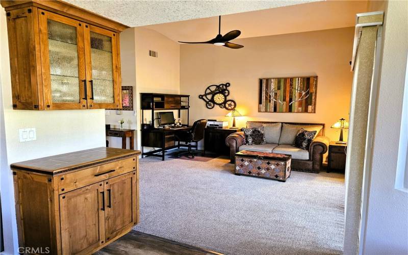 cabinet with hand made inlay top, view into family room