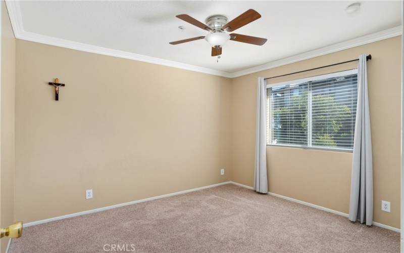 Third bedroom with ceiling fan