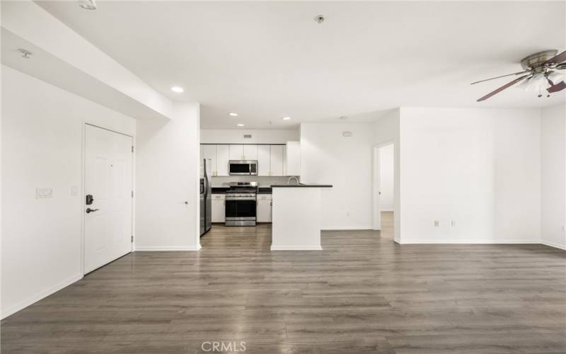 a kitchen open to the living room