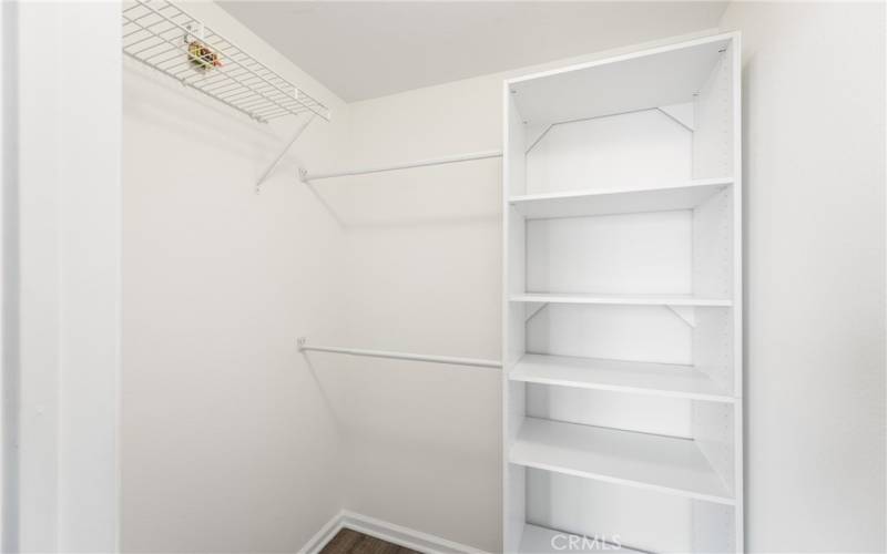 a second walk-in closet, with organizers