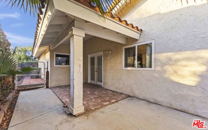 small covered patio, right side of house