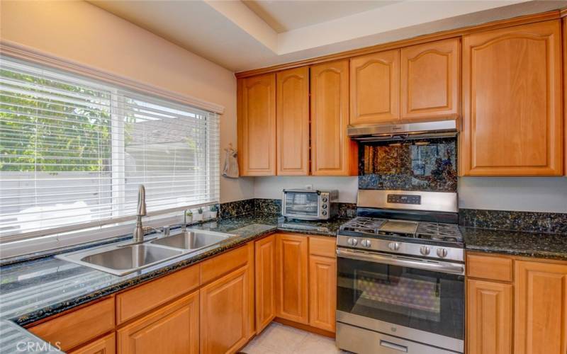 The beautiful kitchen with granite counter tops, S/S appliances, and plenty of cabinet​​‌​​​​‌​​‌‌​​‌​​​‌‌​​​‌​​‌‌​​‌‌​​‌‌​​​​ space.