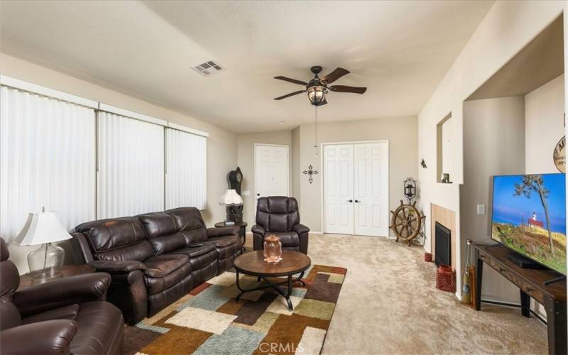 Family Room looking toward front door and bonus room with double door entry.