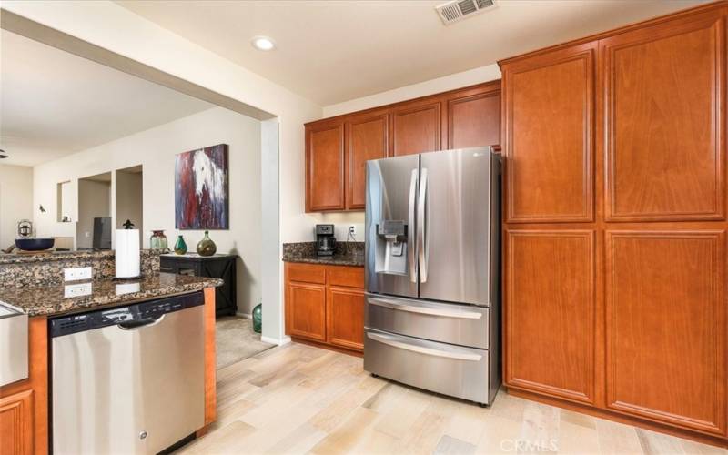 Numerous cabinets.  Open to dining area and family room.