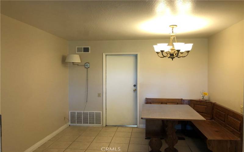 Breakfast nook leading to garage