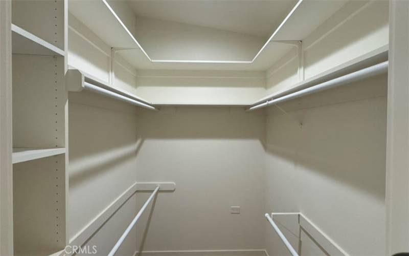 Large walk in closet with extra space above for luggage, etc,