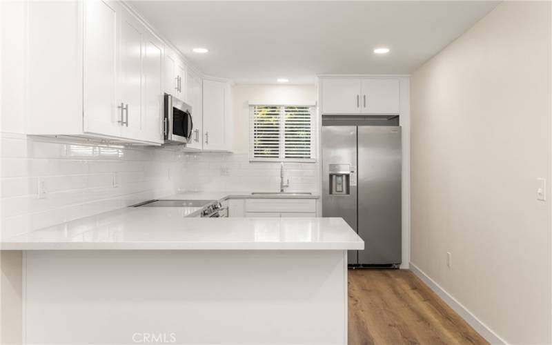 Newly remodeled kitchen with brand new fridge