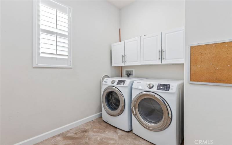 inside laundry room that leads to the garage