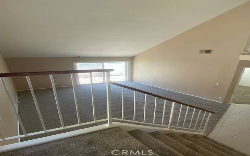 Mid stairway looking down to living room