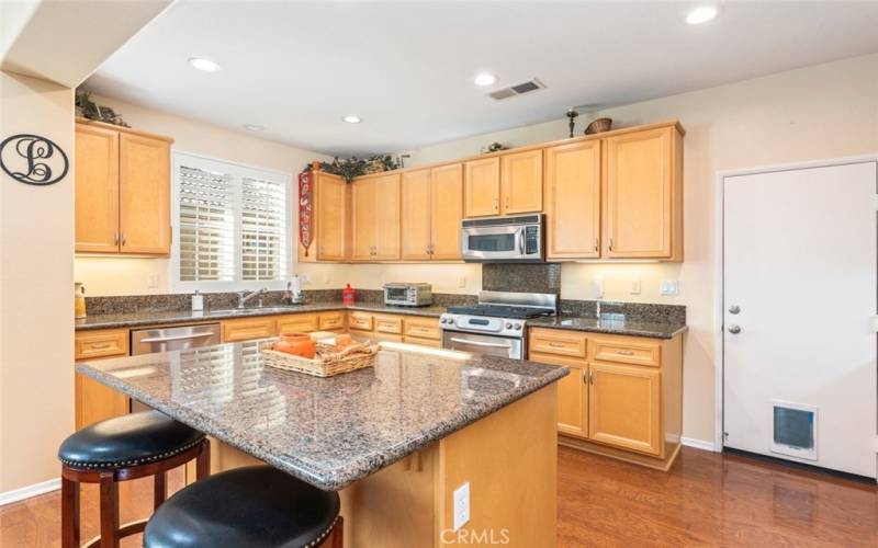 Huge entertainers and chefs kitchen, featuring granite countertops and upgraded stainless steel appliances