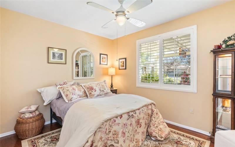 Secondary bedroom with large closet and lots of natural light