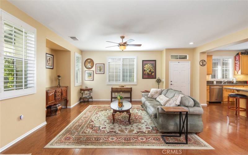 Large open living room with lots of natural lighting