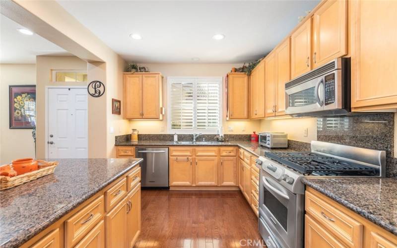 Huge entertainers and chefs kitchen, featuring granite countertops and upgraded stainless steel appliances