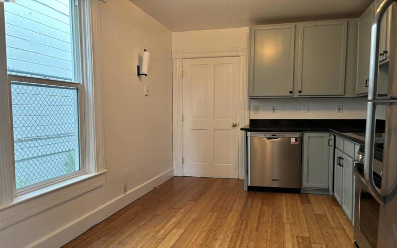 Upgraded kitchen is ideally situated with access to your laundry area and the backyard