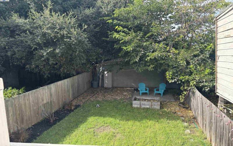 The back porch is right off the laundry room and provides a lovely view of your spacious back yard.