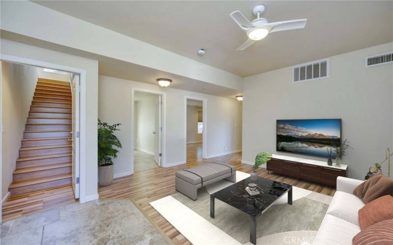 Downstairs family room - virtually staged