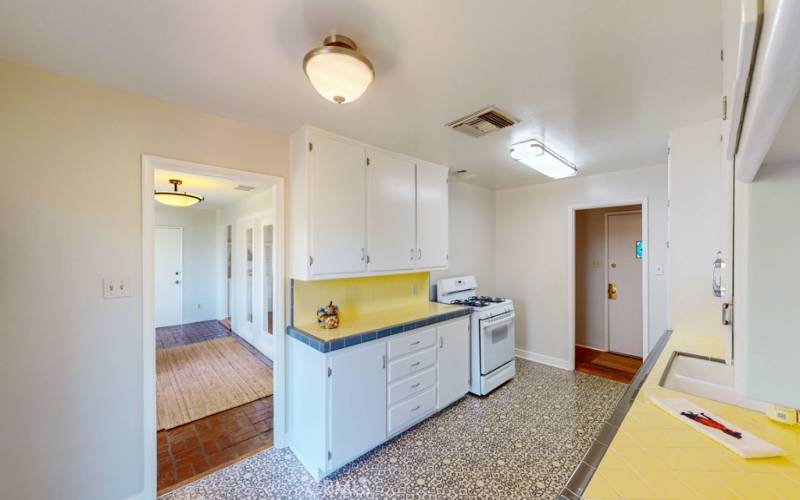 View into bonus room and door to garage