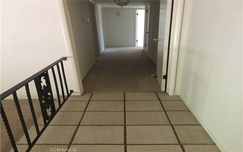 hall/ tile walk way.