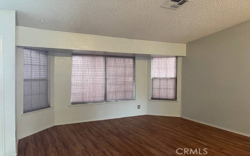 Bay windows in living room and dining room add extra charm!