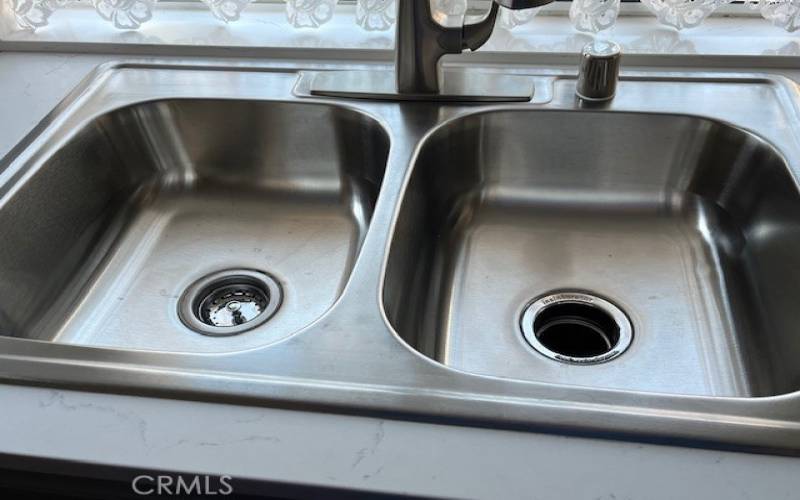 new stainless steel sink and faucet