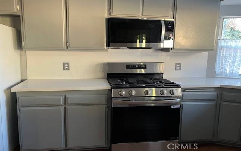 New quartz countertops with back splashes and new appliances!