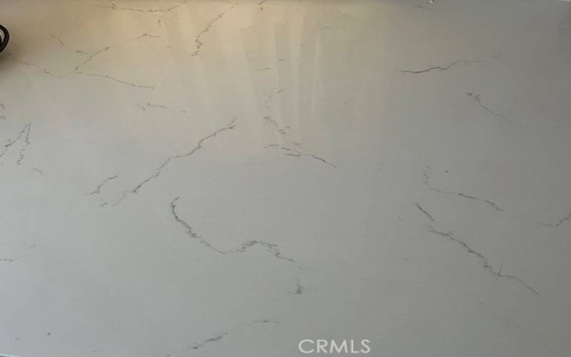 Subtle light gray pattern in new Quartz counter top