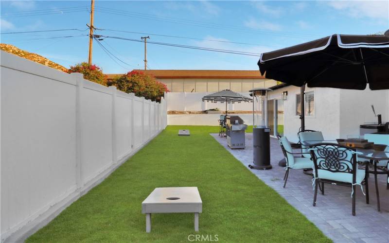 Side yard and patio perfect for entertaining