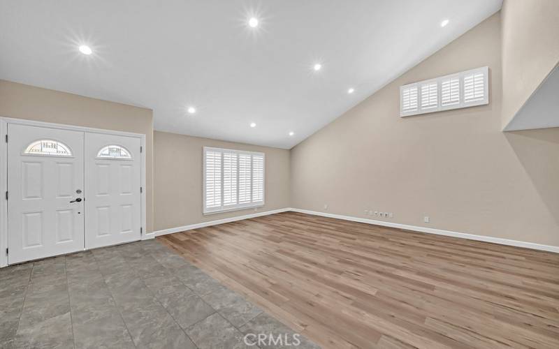 Experience vaulted ceilings upon entering the home.