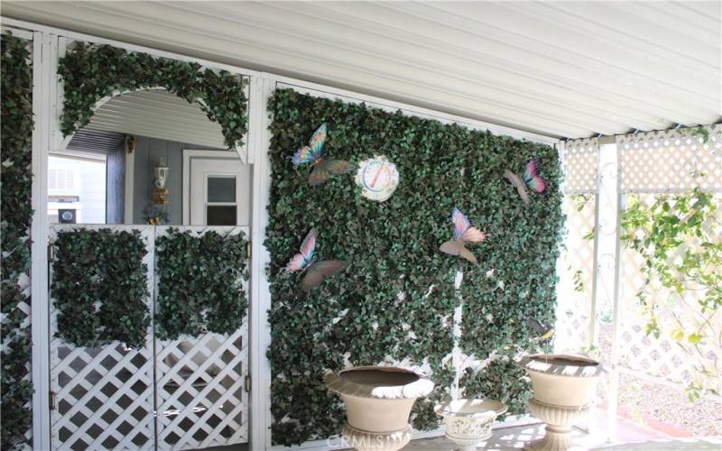 Decorative side patio area off main carport.