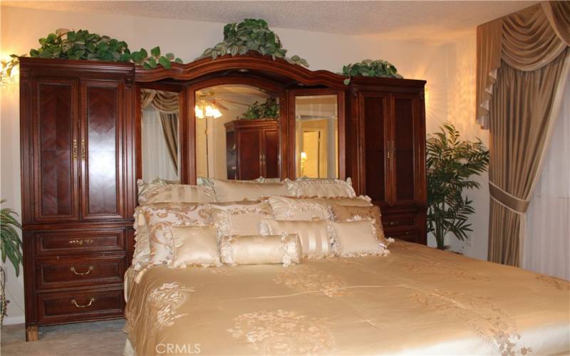 Primary bedroom with exquisite furniture.