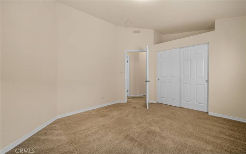 Secondary view of Bedroom #2 with closet and niche for storage or decorator items.