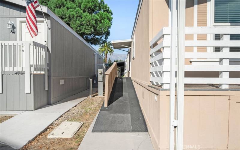 Accessible ramp that enters the unit in the laundry room.