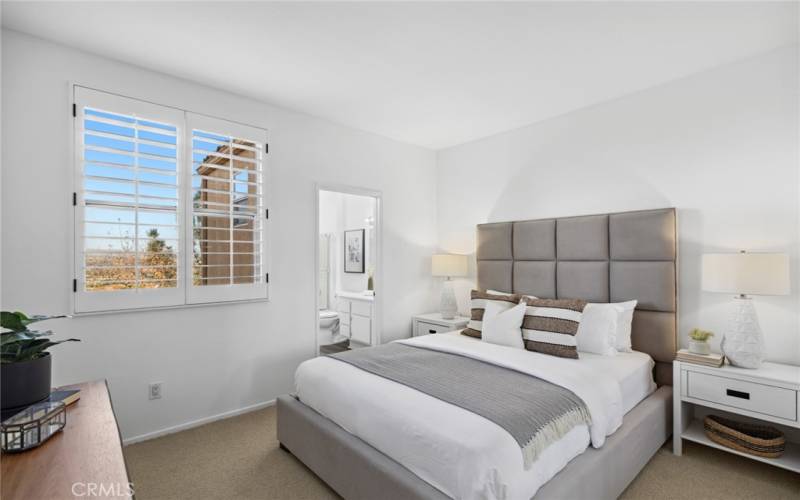 Bedroom w/ classic plantation shutters & gorgeous En-suite