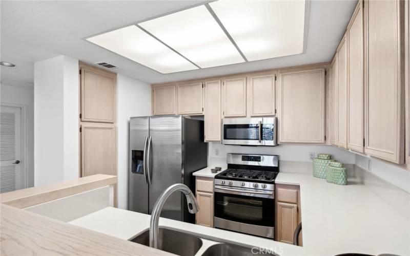 Beautiful kitchen boasts stainless steel appliances