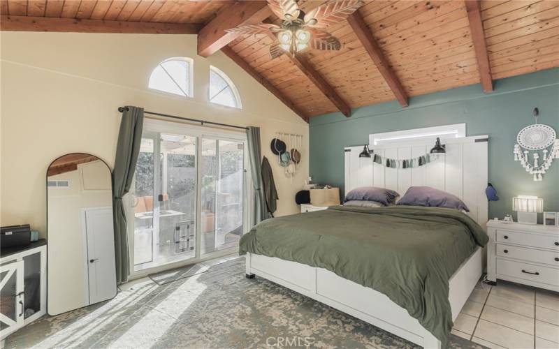 Den converted to fabulous Primary Suite with stunning wood Cathedral ceilings, a walk in closet and access to your bathroom and outside patio