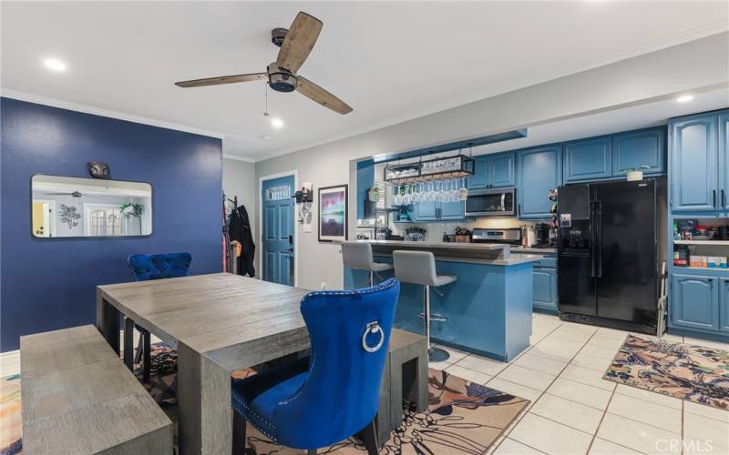 Great open living/kitchen and dining space in cool blue tones!