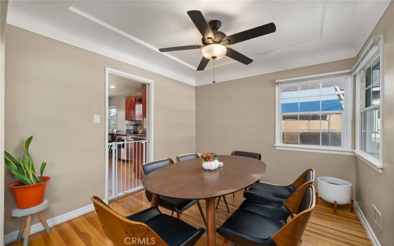 Dining room with kitchen entry.